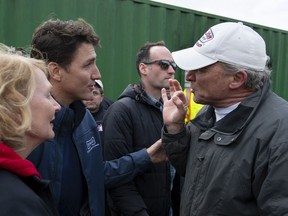 Prime Minister Justin Trudeau is confronted by a man claiming that the Prime Minister's security detail was blocking the road and delaying access for people trying to assist with flood relief efforts in the Ottawa community of Constance Bay on Saturday, April 27, 2019.