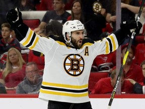 Bruins centre Patrice Bergeron celebrates after scoring a goal against the Hurricanes during the third period in Game 4 of the NHL's Eastern Conference Finals at PNC Arena in Raleigh, N.C., on Thursday, May 16, 2019.