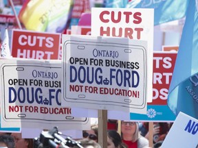 Thousands of teachers, students and union leaders gathered on the front lawn at Queen's Park to protest the Ford government's education cuts on April 6.