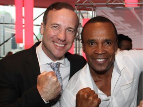 Ringside for Youth's Steve Gallant, left, with boxing legend Sugar Ray Leonard in June 2014.