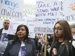 Sherry Goberdhan, right, mother of Arianna Goberdhan stands with sister Carissa outside the Oshawa Courthouse on Thursday May 2, 2019.