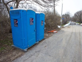 Portable toilets near Churchill Ave N after area residents have been asked to not use their toilets or showers as the Ottawa River continues to rise with no letup for the next few days.