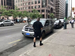 Cars lined up for ticketing and a tow Monday, June 10.