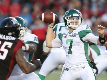 Saskatchewan QB Cody Fajardo looks to make a pass in the first half as the Ottawa Redblacks take on the Saskatchewan Roughriders in CFL action at TD Place in Ottawa. Photo by Wayne Cuddington / Postmedia