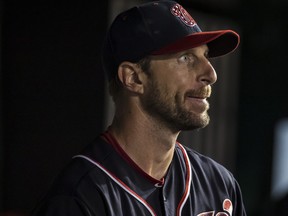 Washington Nationals Max Scherzer looks on from the dugout against the Arizona Diamondbacks during the seventh inning at Nationals Park on June 14, 2019 in Washington, D.C. (Scott Taetsch/Getty Images)