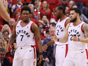 Kyle Lowry #7 and Fred VanVleet #23 of the Toronto Raptors react against the Golden State Warriors in the first half during Game Two of the 2019 NBA Finals at Scotiabank Arena on June 02, 2019 in Toronto, Canada. (Photo by Gregory Shamus/Getty Images)