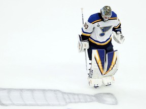 Jordan Binnington of the Blues skates by himself during a timeout in Game 5 of the Stanley Cup final against the Bruins in Boston on Thursday.