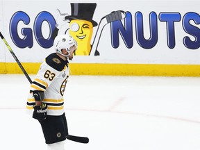 Brad Marchand of the Bruins celebrates his first-period goal against the Blues on Sunday night.