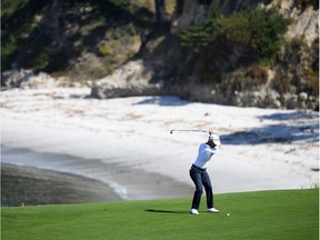 Mike Weir plays a second shot on the sixth hole during a practice round prior to the U.S. Open at Pebble Beach Golf Links on Tuesday.