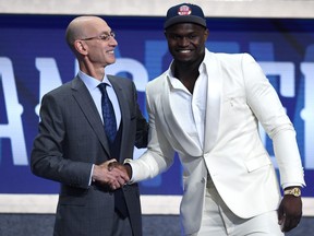 Zion Williamson poses with NBA Commissioner Adam Silver after being drafted with the first overall pick by the New Orleans Pelicans during the 2019 NBA Draft at the Barclays Center on June 20, 2019 in the Brooklyn borough of New York City. (Sarah Stier/Getty Images)