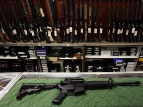 An AR-15 rifle on display at a sporting goods store.