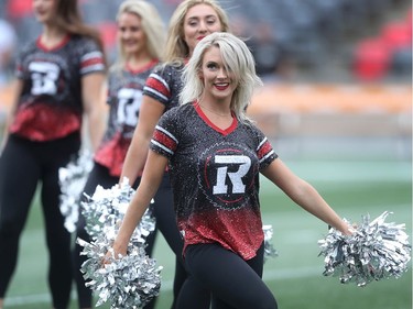 Redblack cheerleaders warm up before the game between the Ottawa Redblacks and the Saskatchewan Roughriders in CFL action at TD Place in Ottawa. Photo by Wayne Cuddington / Postmedia