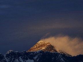 Light illuminates Mount Everest, during the in Solukhumbu District also known as the Everest region, in this picture taken November 30, 2015. (REUTERS/Navesh Chitrakar/File Photo)