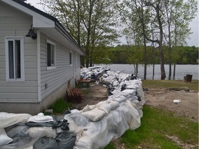 A wall of sandbags was still protecting the Constance Bay home of Paul Graveline this weekend.