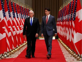 U.S. Vice-President Mike Pence, left, and Canadian Prime Minister Justin Trudeau arrive for a joint news conference in Ottawa on May 30, 2019.