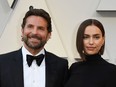 In this file photo taken on February 24, 2019 Best Actor nominee for "A Star is Born" Bradley Cooper (L) and his wife Russian model Irina Shayk arrive for the 91st Annual Academy Awards at the Dolby Theatre in Hollywood.