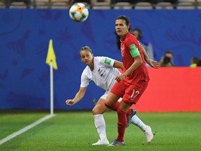 Canada's Christine Sinclair battles New Zealand's Ria Percival for possession of the ball during a 2019 Women's World Cup Group E match on Saturday in France.