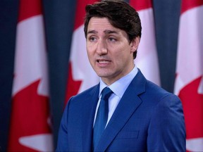 In this file photo taken on March 7, 2019, Prime Minister Justin Trudeau speaks to the media at the national press gallery in Ottawa. (LARS HAGBERG/AFP/Getty Images)