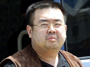 This file photo taken on May 4, 2001 shows Kim Jong-Nam, son of North Korean leader Kim Jong-Il, getting off a bus to board an ANA905 (All Nippon Airways) airplane at Narita airport near Tokyo.