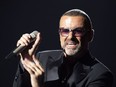 In this file picture taken on September 9, 2012, British singer George Michael performs on stage during a charity gala for the benefit of Sidaction, at the Opera Garnier in Paris.