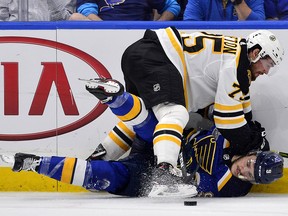 St. Louis Blues left wing Sammy Blais (9) is checked by Boston Bruins defenceman Connor Clifton (75) during Game 6 of the Stanley Cup final at Enterprise Center. (Jeff Curry-USA TODAY Sports)