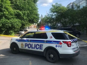 An Ottawa police vehicle blocks High Street near Carling Avenue after a shooting on Saturday, June 22, 2019. Ashley Fraser, Postmedia