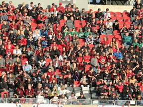 The fans in the upper deck in the bright sun at TD Place in Ottawa.