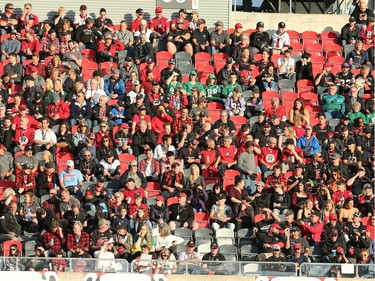 The fans in the upper deck in the bright sun in the first half as the Ottawa Redblacks take on the Saskatchewan Roughriders in CFL action at TD Place in Ottawa. Photo by Wayne Cuddington / Postmedia