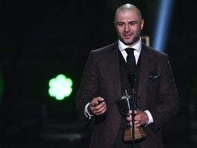 Mark Giordano of the Calgary Flames accepts the James Norris Memorial Trophy awarded to the defense player who demonstrates throughout the season the greatest all-around ability in the position during the 2019 NHL Awards at the Mandalay Bay Events Center on June 19, 2019 in Las Vegas. (Ethan Miller/Getty Images)