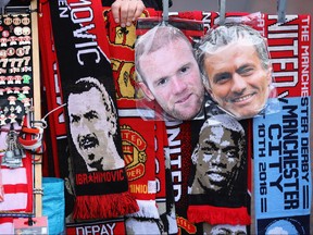 MANCHESTER, ENGLAND - SEPTEMBER 10: Souvenirs for sale prior the Premier League match between Manchester United and Manchester City at Old Trafford on September 10, 2016 in Manchester, England..