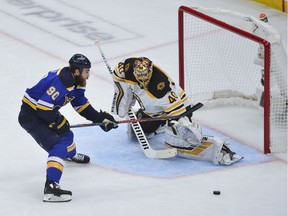 Blues centre Ryan O'Reilly loses the puck as he skates toward Bruins goaltender Tuukka Rask during the first period of Game 6 on Sunday night.