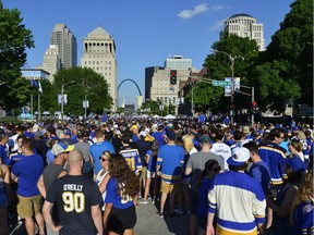 Blues fans gather in a plaza before Game 6 of the Stanley Cup final against the Bruins at Enterprise Center in St. Louis on Sunday night.