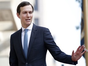 In this Aug. 29, 2018, file photo, White House Adviser Jared Kushner waves as he arrives at the Office of the United States Trade Representative in Washington. (AP Photo/Jacquelyn Martin, File)