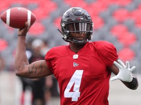 Ottawa RedBlacks QB Dominique Davis throws during practice at TD Place in Ottawa on Tuesday, June 18, 2019.