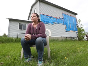 Grace Campbell outside her damaged home in Dunrobin. Her family has been living in a rental since a tornado slammed into Dunrobin on Sept. 21, 2018.