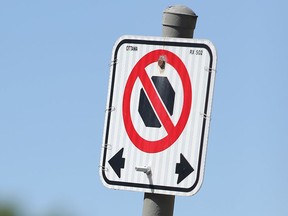 Illegally parked vehicles will be removed from downtown streets starting in the wee hours of Canada Day.