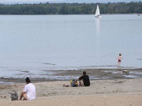A family relaxes at Britannia Beach in Ottawa Ontario Wednesday Sept 7, 2016. Tony Caldwell