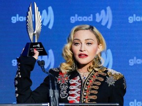 Singer Madonna holds up her Advocate for Change award during the 30th annual GLAAD awards ceremony in New York City, New York, U.S., May 4, 2019.