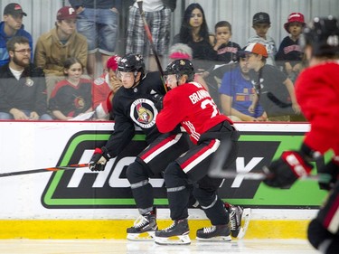 The Ottawa Senators development camp was at the Bell Sensplex for a 3-on-3 tournament Saturday, June 29, 2019.  #26 Erik Brannstrom checks Jonathan Tychonick.