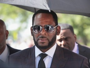 R&B singer R. Kelly leaves the Leighton Criminal Courts Building following a hearing on June 26, 2019 in Chicago.