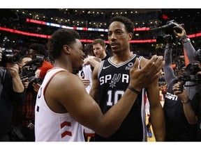 San Antonio Spurs DeMar DeRozan SG (10) hugs his former teammate Toronto Raptors Kyle Lowry PG (7) after the game in Toronto, Ont. on Saturday February 23, 2019.