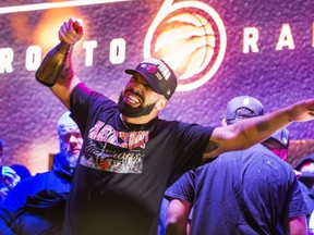 Rapper Drake celebrating the Toronto Raptors victory over the Golden State Warriors in the NBA Finals at Jurassic Park outside of the Scotiabank Arena in Toronto, Ont. on Thursday June 13, 2019. Ernest Doroszuk/Toronto Sun/Postmedia