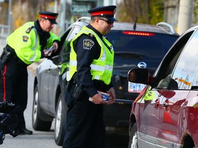 OPP, Toronto Police and other Ontario Regional forces join to kick off the annual Ride program ahead of the holiday season near Humber College in Toronto on Thursday November 19, 2015. (Dave Abel/Toronto Sun/Postmedia Network)