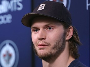 Jacob Trouba addresses media as the Jets cleaned out their lockers after a first-round playoff loss to the Blues in April.