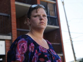 photographed in front of her apartment building at the corner of Booth and Albert streets, says she is upset that Bluesfest fans are using the area around the building as a toilet.