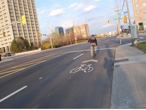 An Ottawa cyclist uses a  "sharrow" lane. Cyclists and drivers aren't always tolerant of each other.