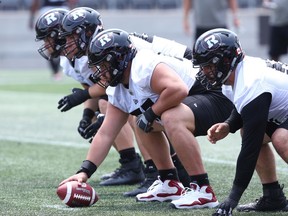 Offensive line of the Ottawa Redblacks during practice at TD Place in Ottawa, July 9, 2019.