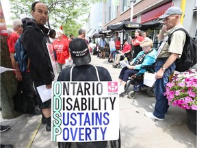 Friends of Acorn rally in front of the ODSP office on Preston St to demand that the Ford government stop cutting their access to ODSP. The theme of the rally will be "ODSP on Life Support", July 11, 2019. Photo by Jean Levac/Postmedia News 131920
