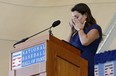 Brandy Halladay speaks on behalf of her late husband, Roy Halladay, during the Baseball Hall of Fame induction ceremony at Clark Sports Center on Sunday. (GETTY IMAGES)