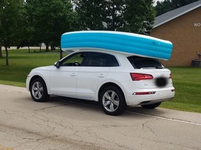 Cops in Dixon, Illinois have arrested a woman, who is accused of letting her kids ride an inflatable pool that was strapped on top of her vehicle. (Dixon Police Department)
